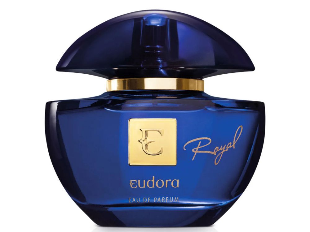 Os-Melhores-Eau-de-Parfum-Eudora-7-mais-Queridos Eudora Royal Eau de Parfum é uma fragrância que exala luxo e realeza. Com uma combinação de notas amadeiradas, reflete a elegância da família Chypre Amadeirado. As nuances elegantes e luxuosas são perfeitas para a mulher confiante que busca o extraordinário em sua rotina.